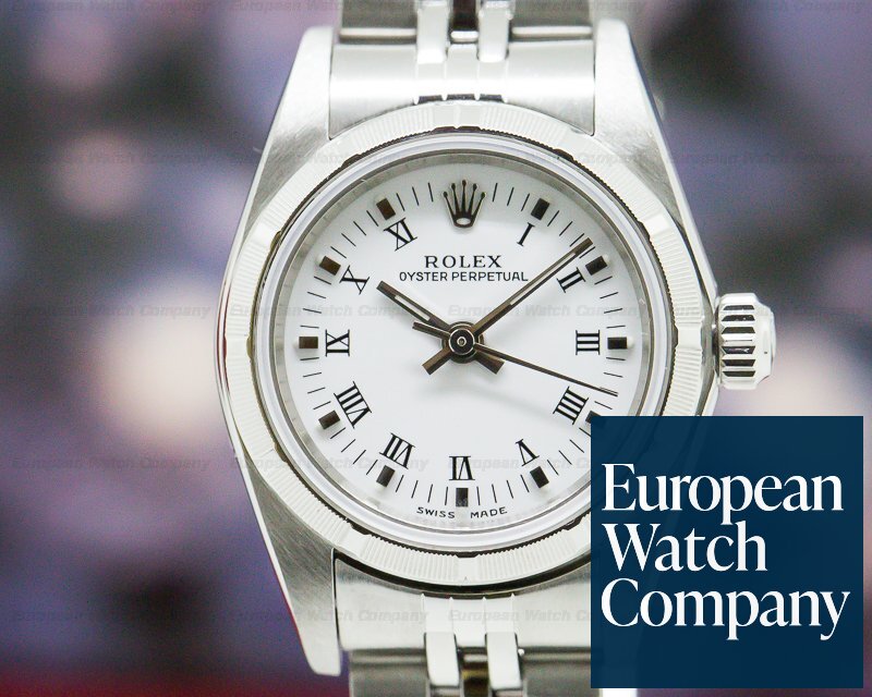 Rolex Oyster Perpetual Ladies White Roman Dial Engine Turned Bezel SS Ref. 76030