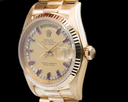 Rolex Day Date Diamond and Ruby String Dial Yellow Gold Ref. 18038 